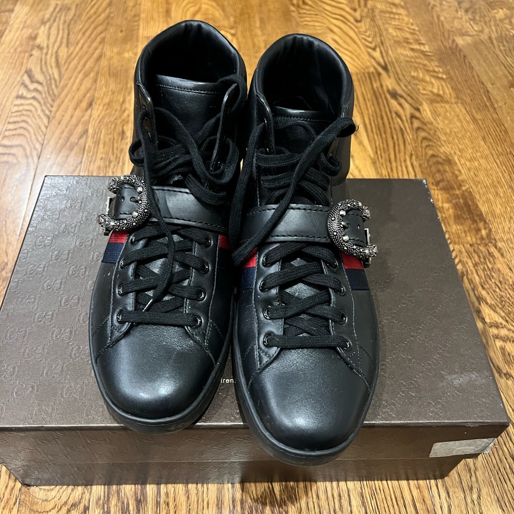Gucci high top shoes. Only worn once. Comes with box.